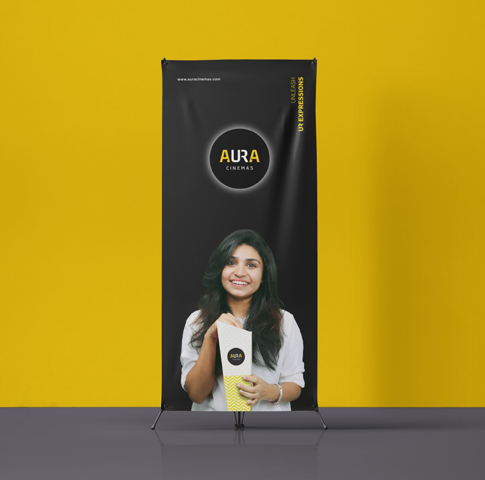 Aura cinemas branding-standee design
