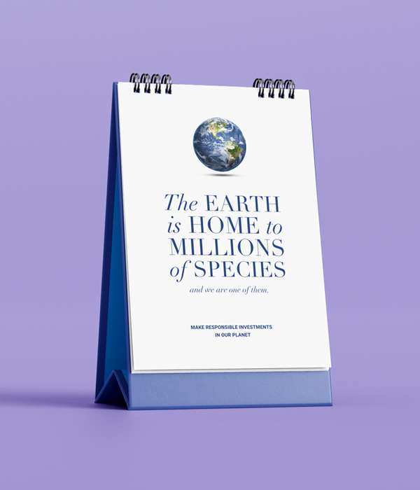 Mayan Homes 2025 desk calendar featuring a message on environmental responsibility with a globe illustration. Vizag-based real estate group promotes sustainable investments and a decade-long legacy.