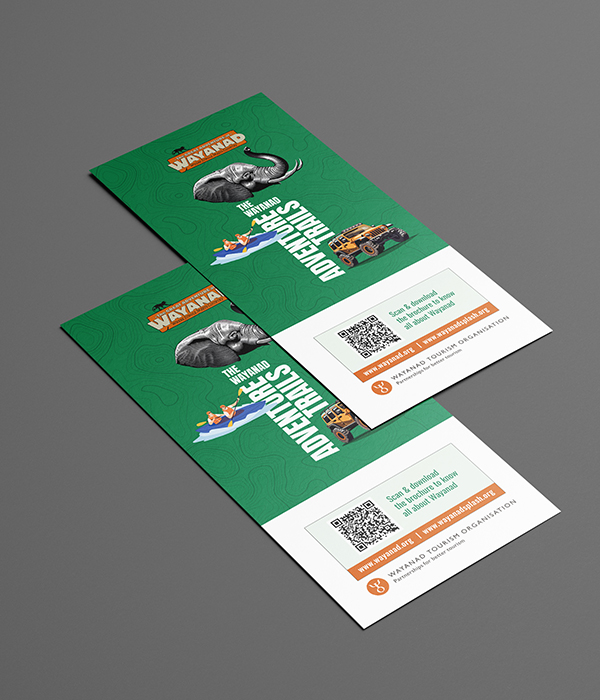 Two brochures for 
                'The Wayanad Adventure Trails' featuring an elephant illustration and a QR code for more information, promoting tourism in Wayanad.