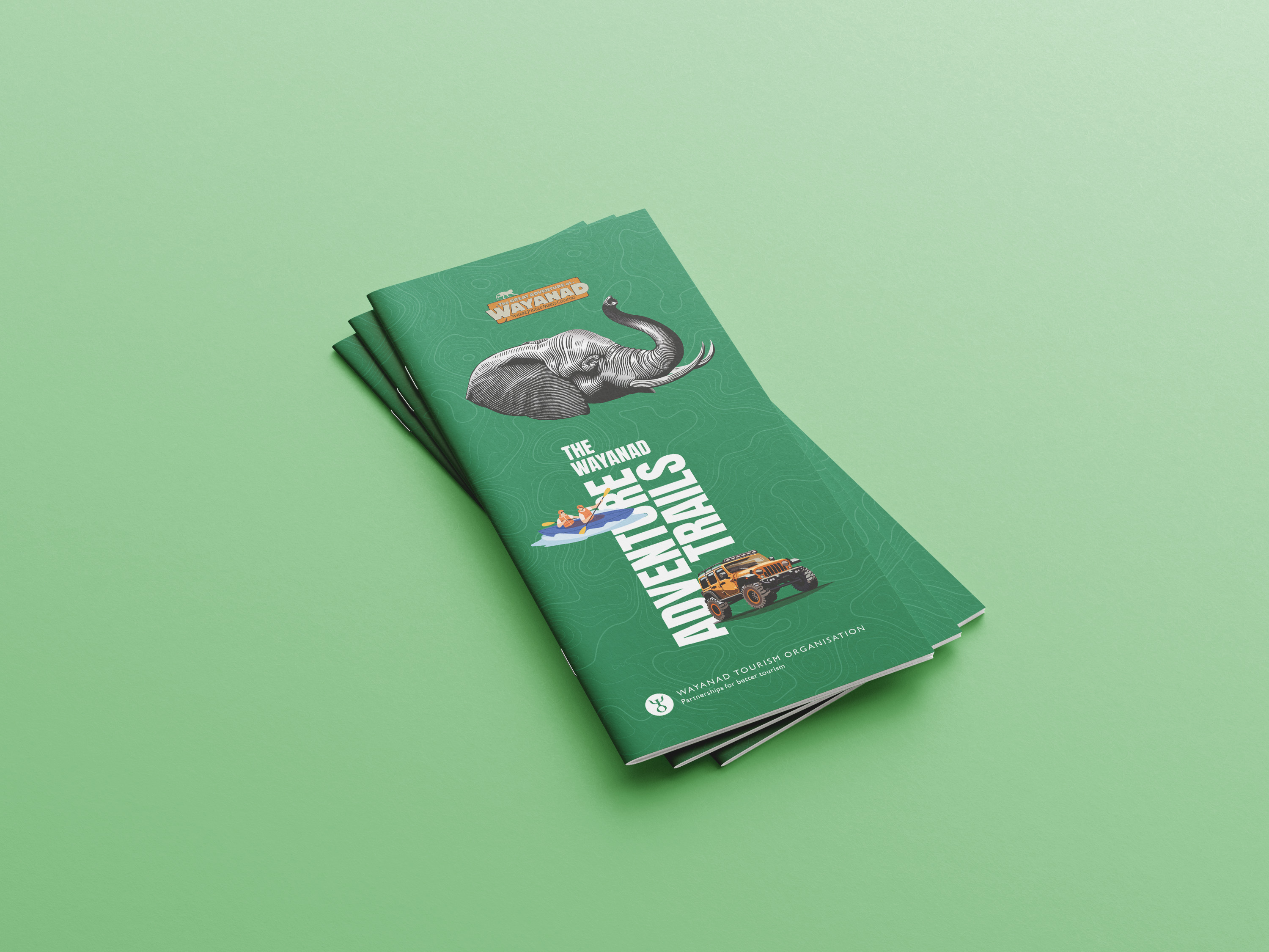 Wayanad Tourism Organisation adventure trails brochure with elephant illustration, jeep safari, and kayaking – guide to scenic landscapes, resorts, homestays, and cultural experiences in Wayanad, Kerala