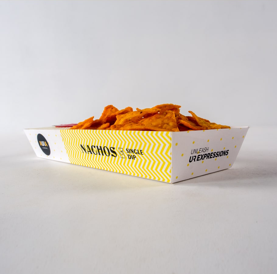 Aura Cinemas nachos with single dip in a vibrant yellow zigzag-patterned tray, perfect for a delicious cinema snack
