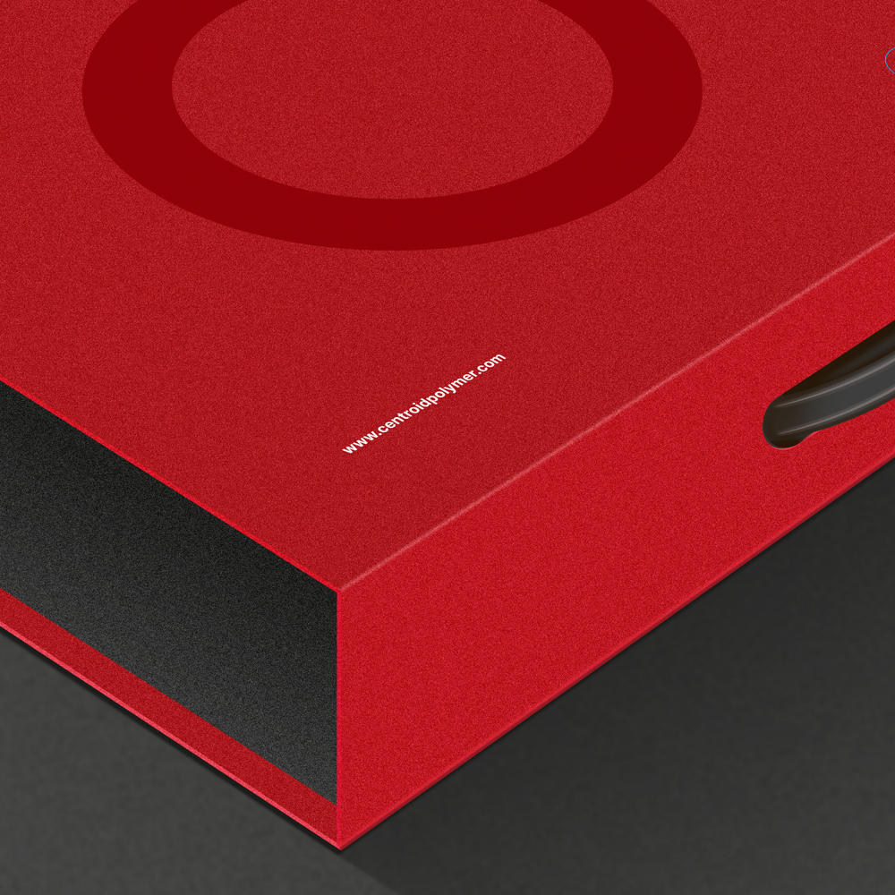 Detailed view of Centroid Polymer Technologies red portfolio box showing the 'Concept to Reality' label and logo, emphasizing design and manufacturing expertise