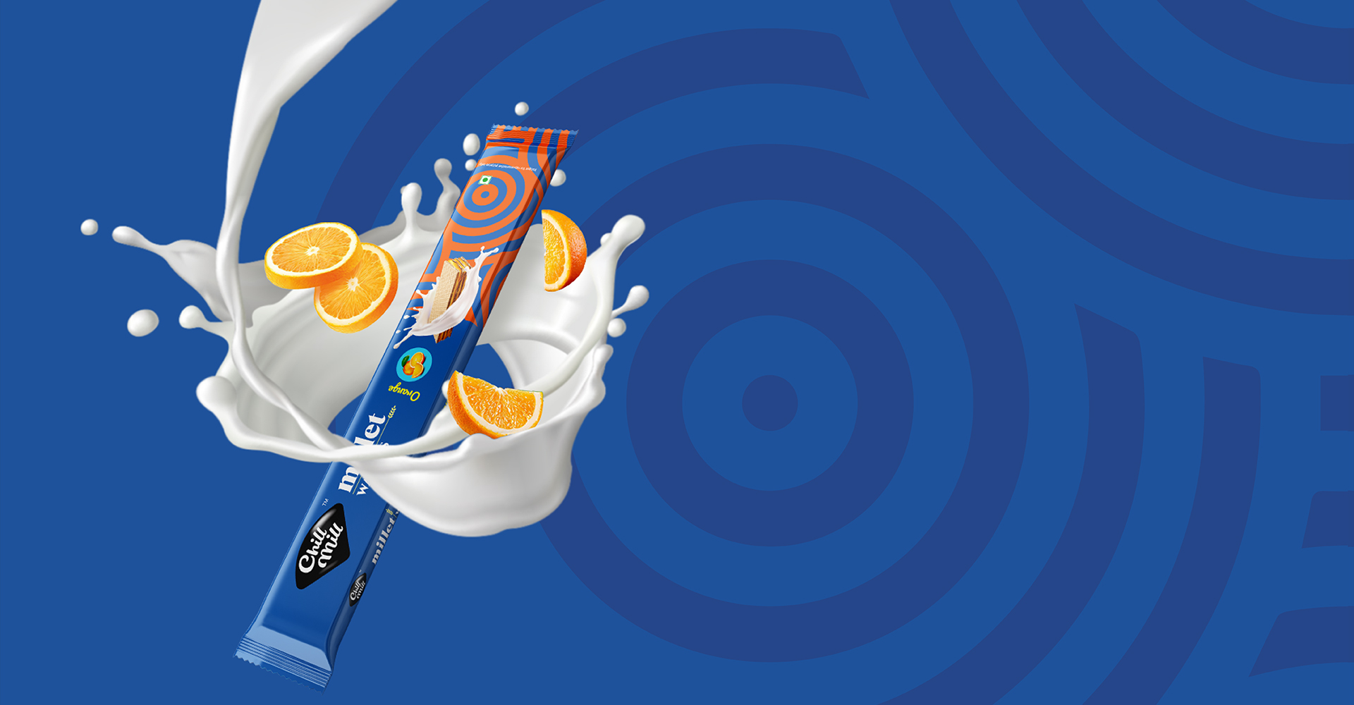 Chill Mill orange flavored millet wafer bar with fresh orange slices and milk splash – healthy and tasty snack innovation