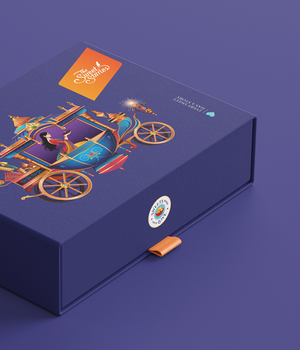 Diwali special sweet box from Sweet Stories 
                Hyderabad featuring a vibrant, artistic design with a girl casting a magical glow, and the slogan 'Every Sweet Has A Story