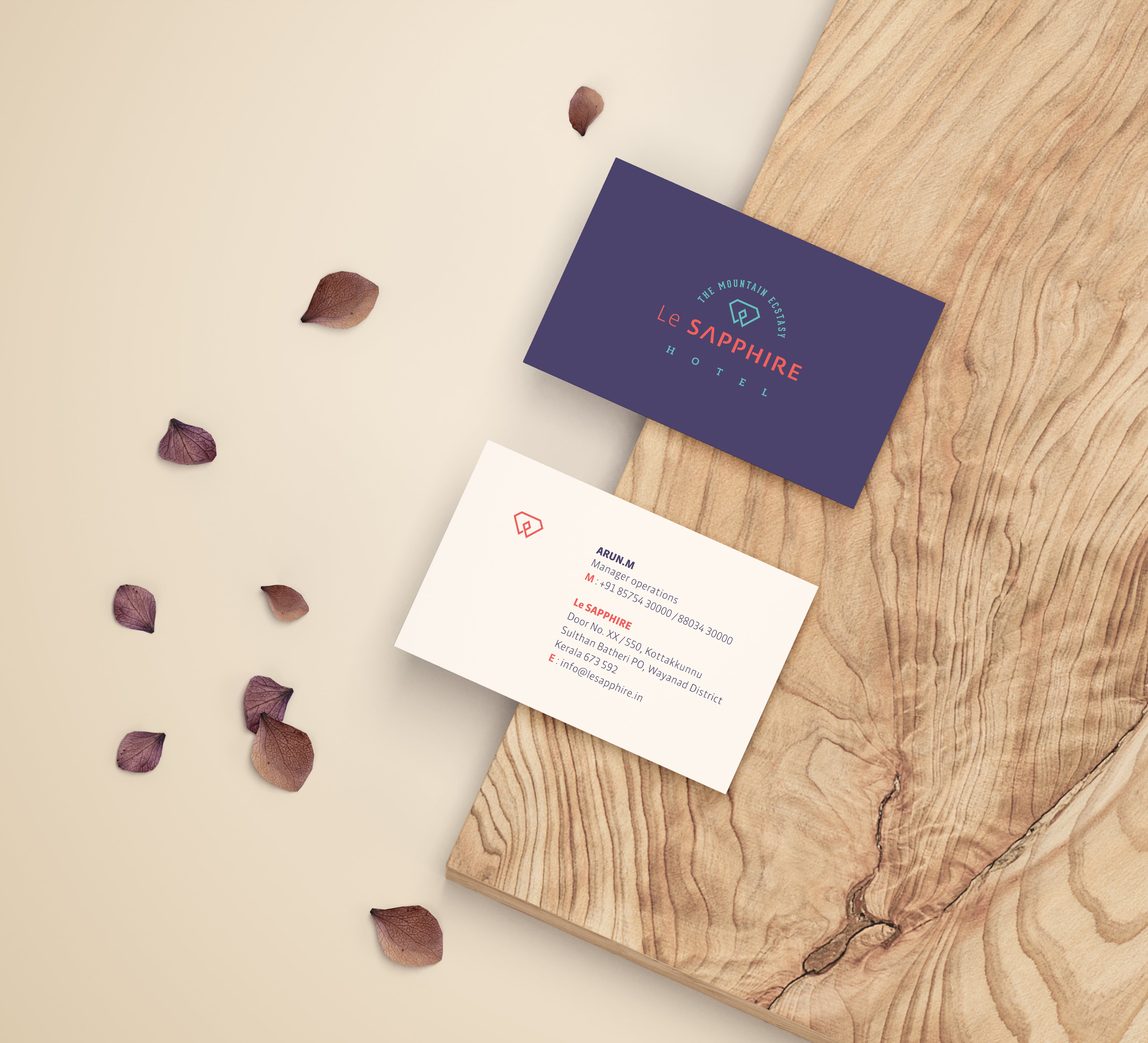 Le SAPPHIRE Hotel manager's business card with contact details and logo, showcasing brand identity