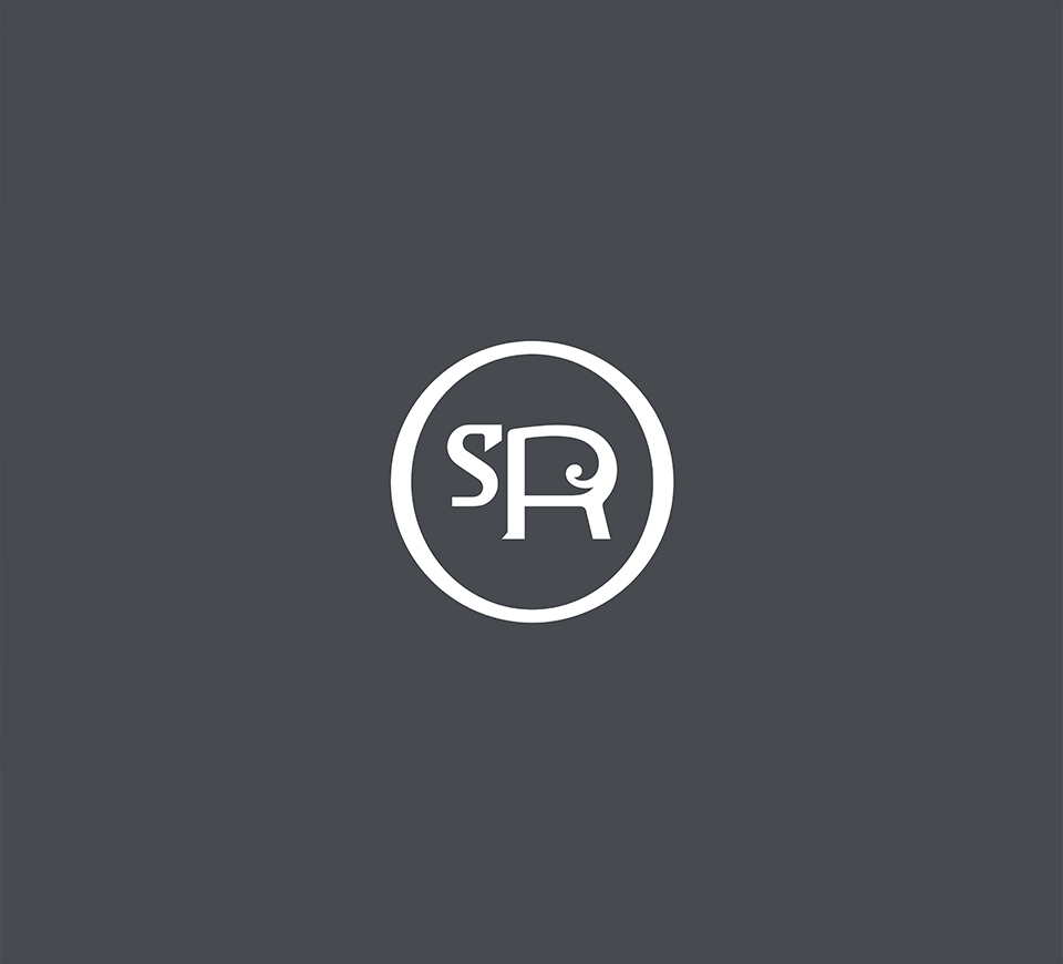 Logo for Silk Route Escapes, a luxury travel company. The logo features a stylized SR monogram inside a white circle against a gray background.