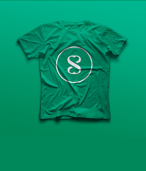 A bright green t-shirt with a white circular logo featuring 
                a stylized 'S' in the center, representing the Sunntv brand.